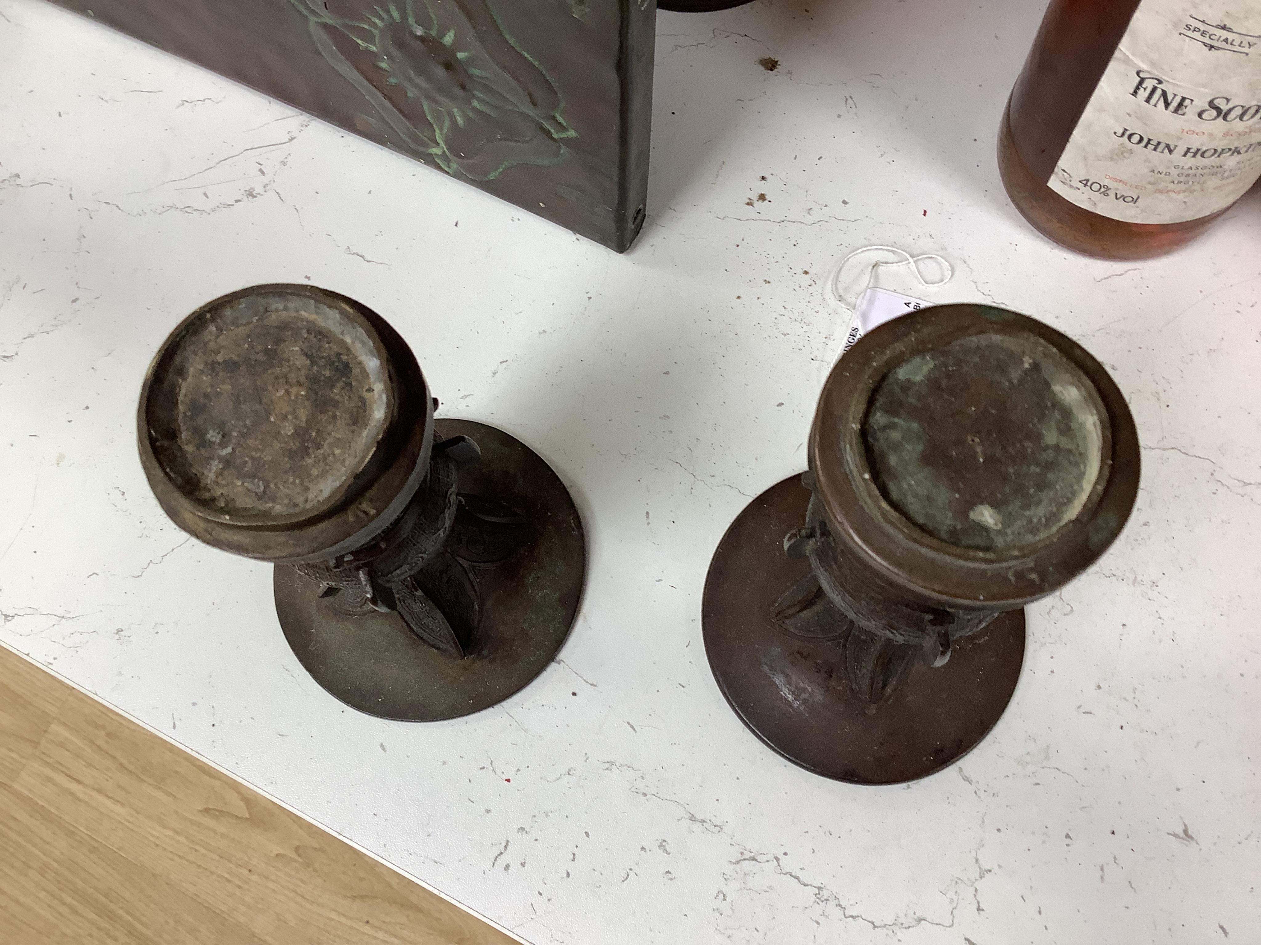 A pair 17th/18th century Chinese archaistic bronze gu vases, and a similar square vase, fanggu, Ming dynasty, tallest 18cm. Condition - poor to fair